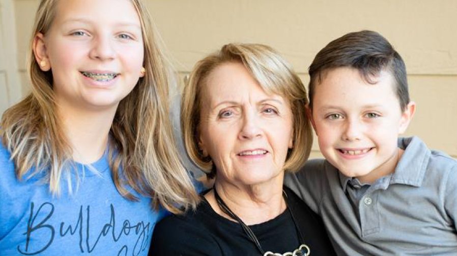 BodyGuardian Remote Cardiac Monitor patient Barbara and her smiling grandchildren.