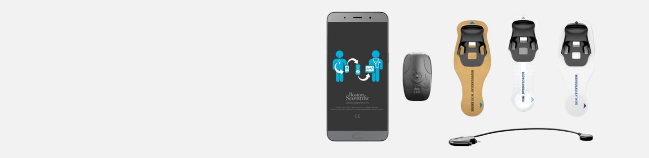 BodyGuardian MINI PLUS Remote Cardiac Monitor components: mobile app,  monitor, and a variety of adhesives and lead wires.